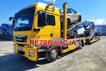 MAN TGM 15.29 z przyczepą Kaessbohrer